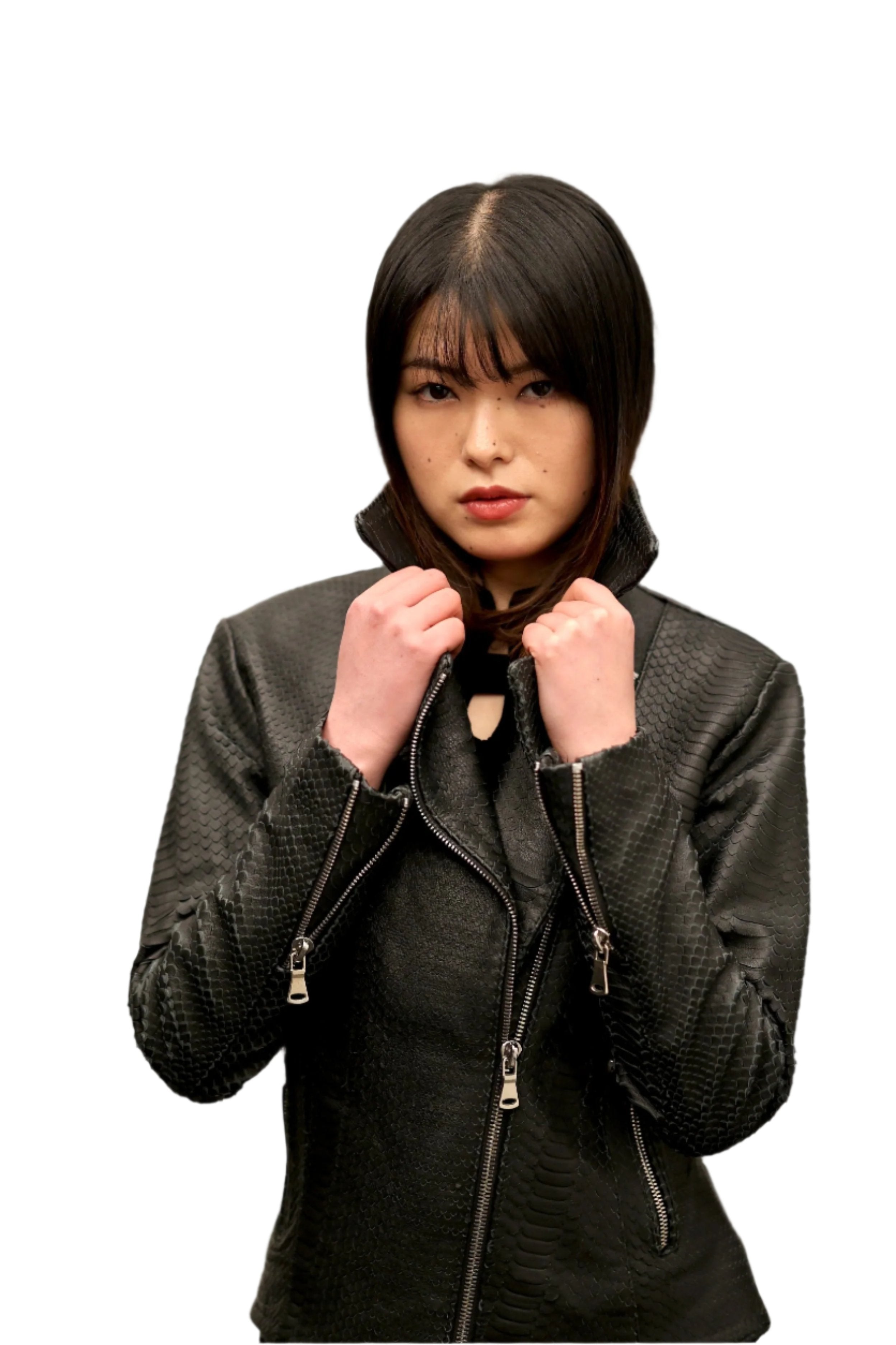 Lifestyle image of Orryx jacket styled with black leather pants - women pocket with zipper on matte black python leather