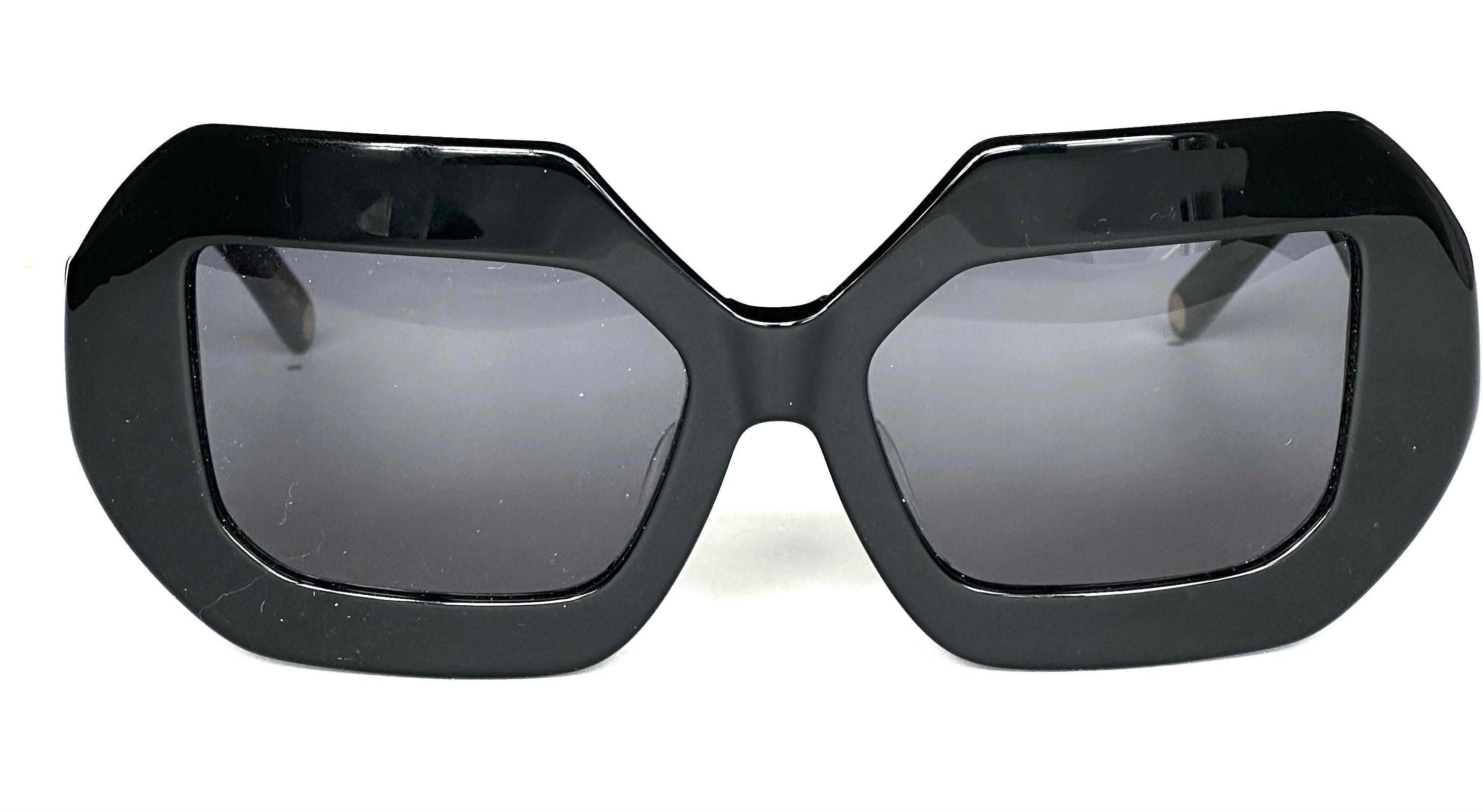 Stylish Renaissance sunglasses - featuring a sleek black frame and dark lenses - Elegant black-framed Renaissance sunglasses