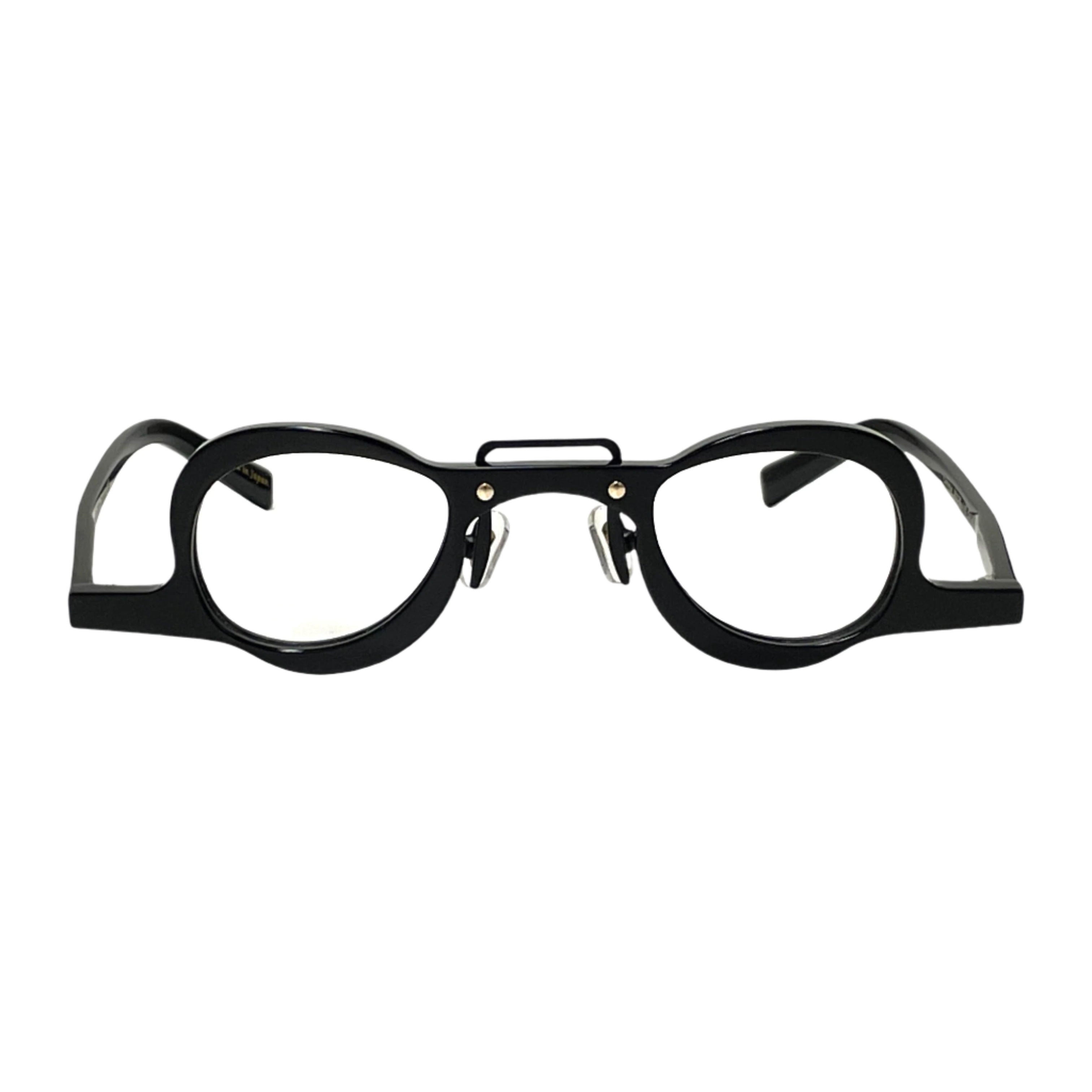 Genesis Optical Frame  Acetate Eyewear - Nose Pad Frames - Polycarbonate Lenses - A pair of black glasses laying on a flat surface
