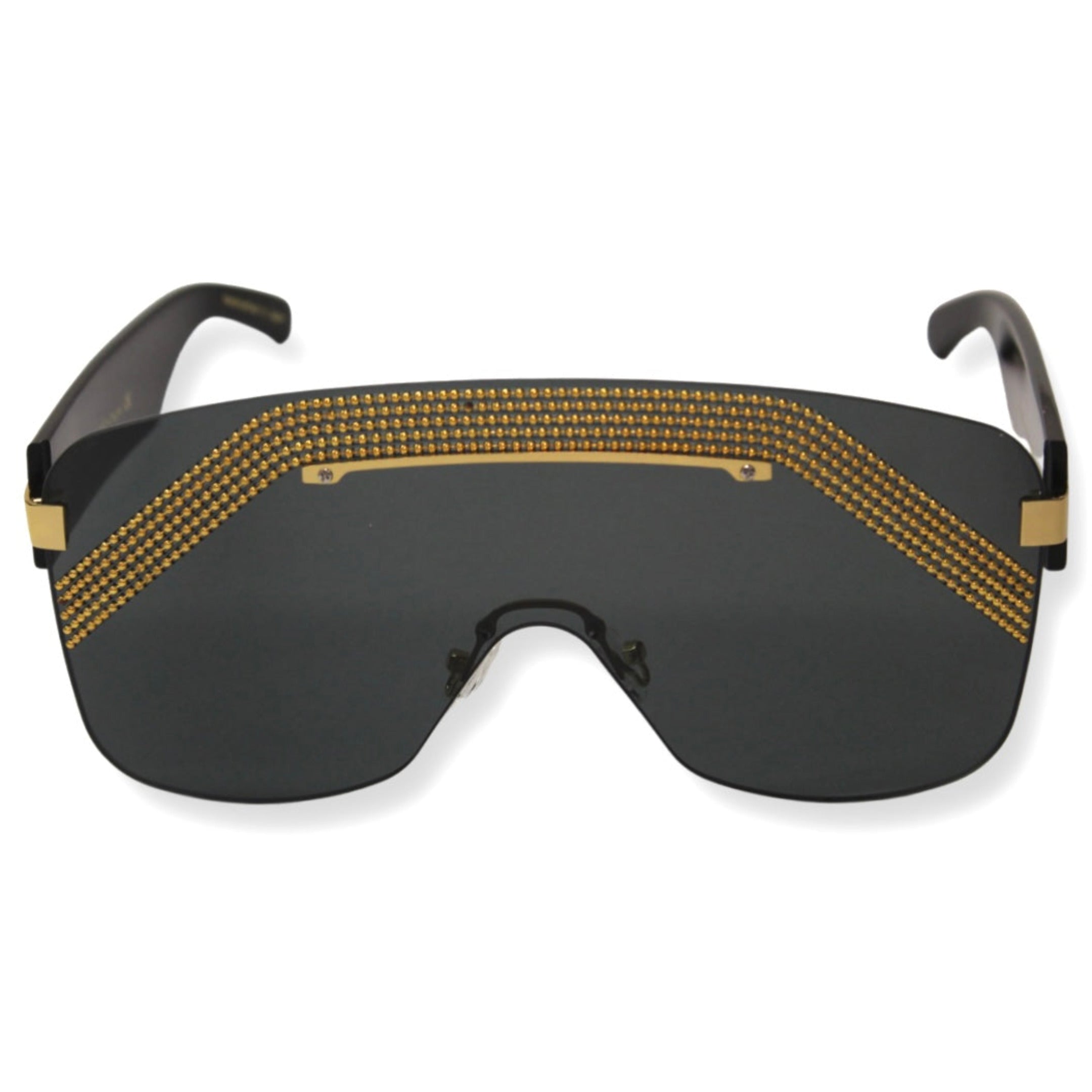 A pair of oversized black sunglasses with gold accents on the hinges - Men's Relentless oversized shield sunglasses by Kazoku Lunettes with solid grey lenses - luxury Relentless sunglasses featuring bold shield design and gold coating