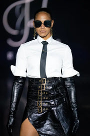 CROC STMPED LEATHER SKIRT WITH 6 BUCKLES GOLD COLOR OPEN SIDE . 
OVER THE KNEE