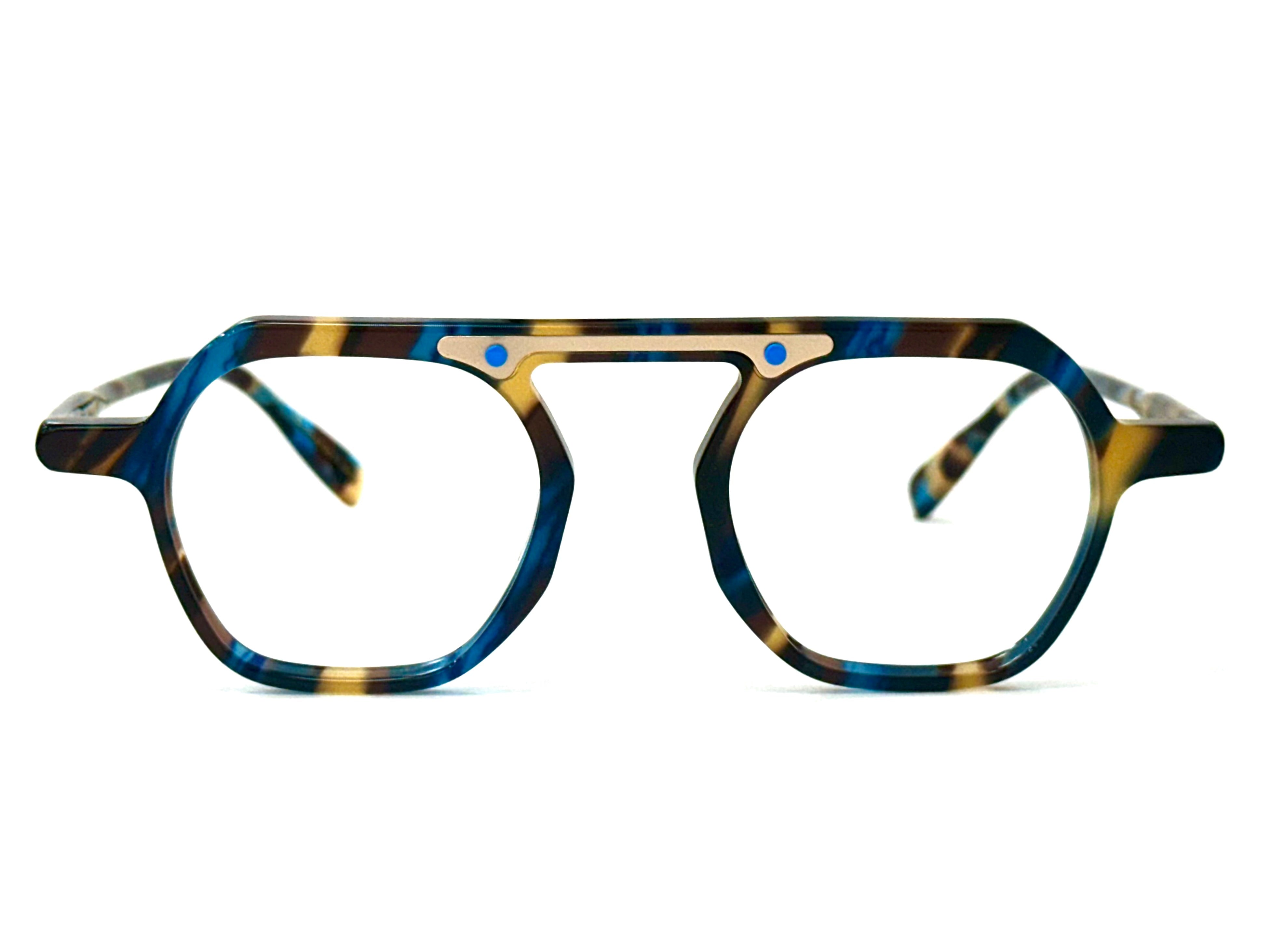 A pair of blue and brown glasses resting on a flat surface - Anti-glare lenses reducing reflections