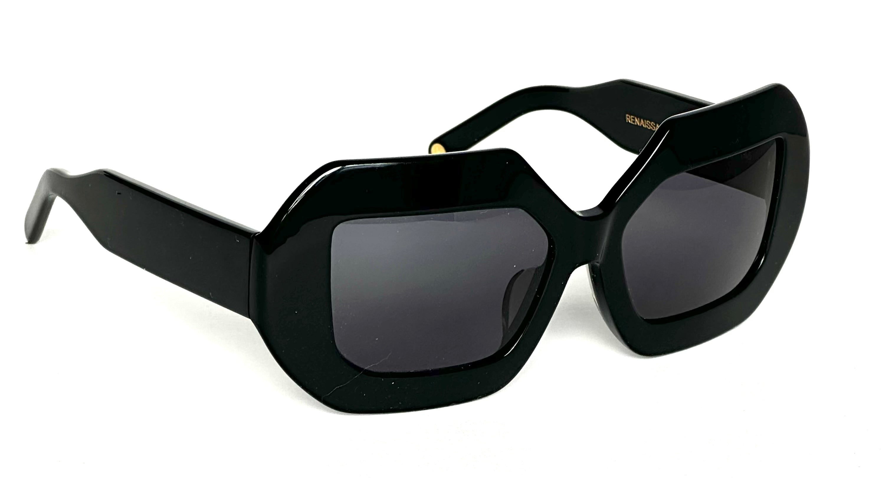Close-up of the scratch-resistant, UV-protective CR39 lens - Top-down view of the Renaissance sunglasses' acetate frame