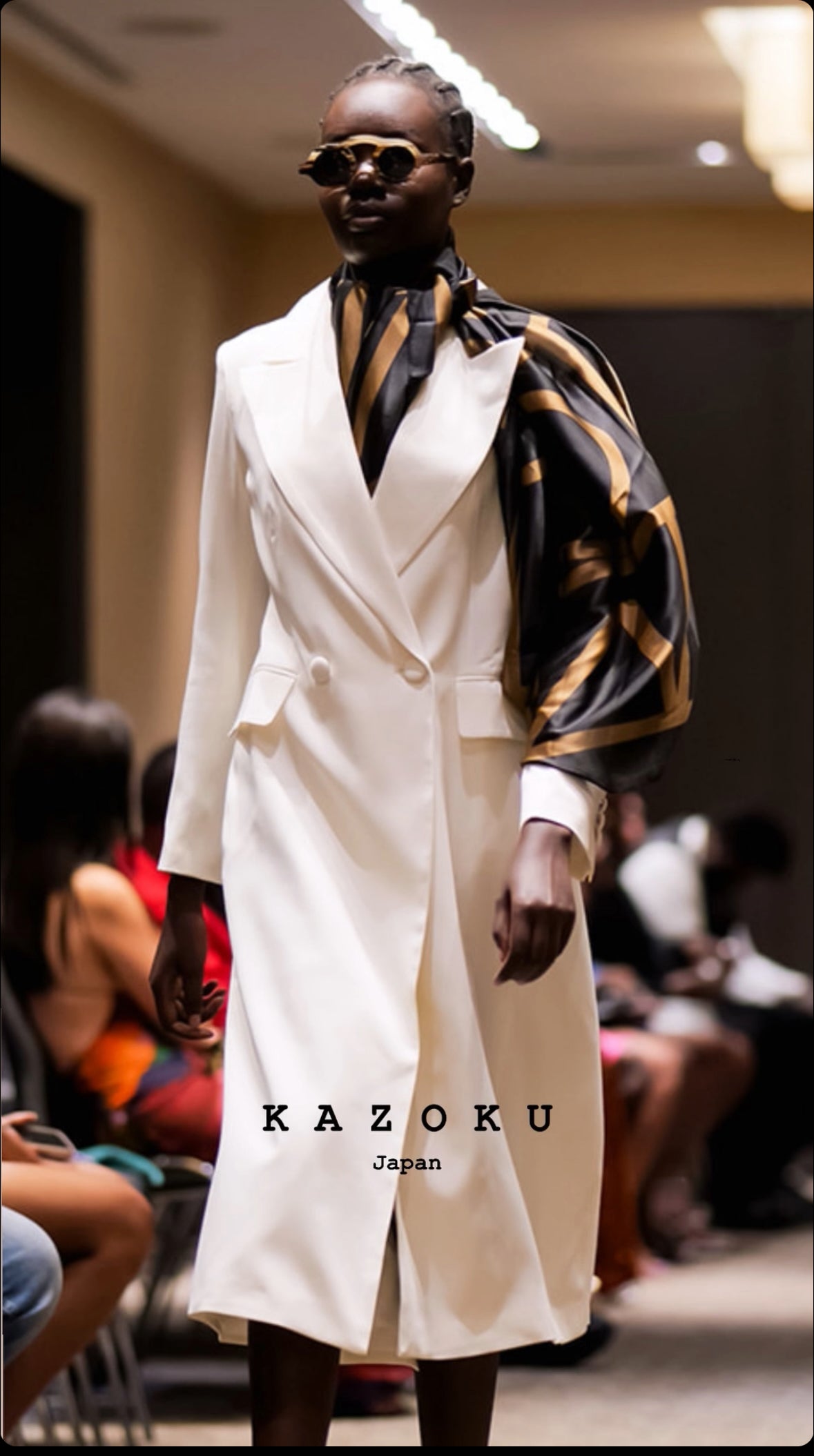 Beige blazer in natural daylight emphasizing soft neutral color - Tailored waist jacket in beige – elegant and versatile design