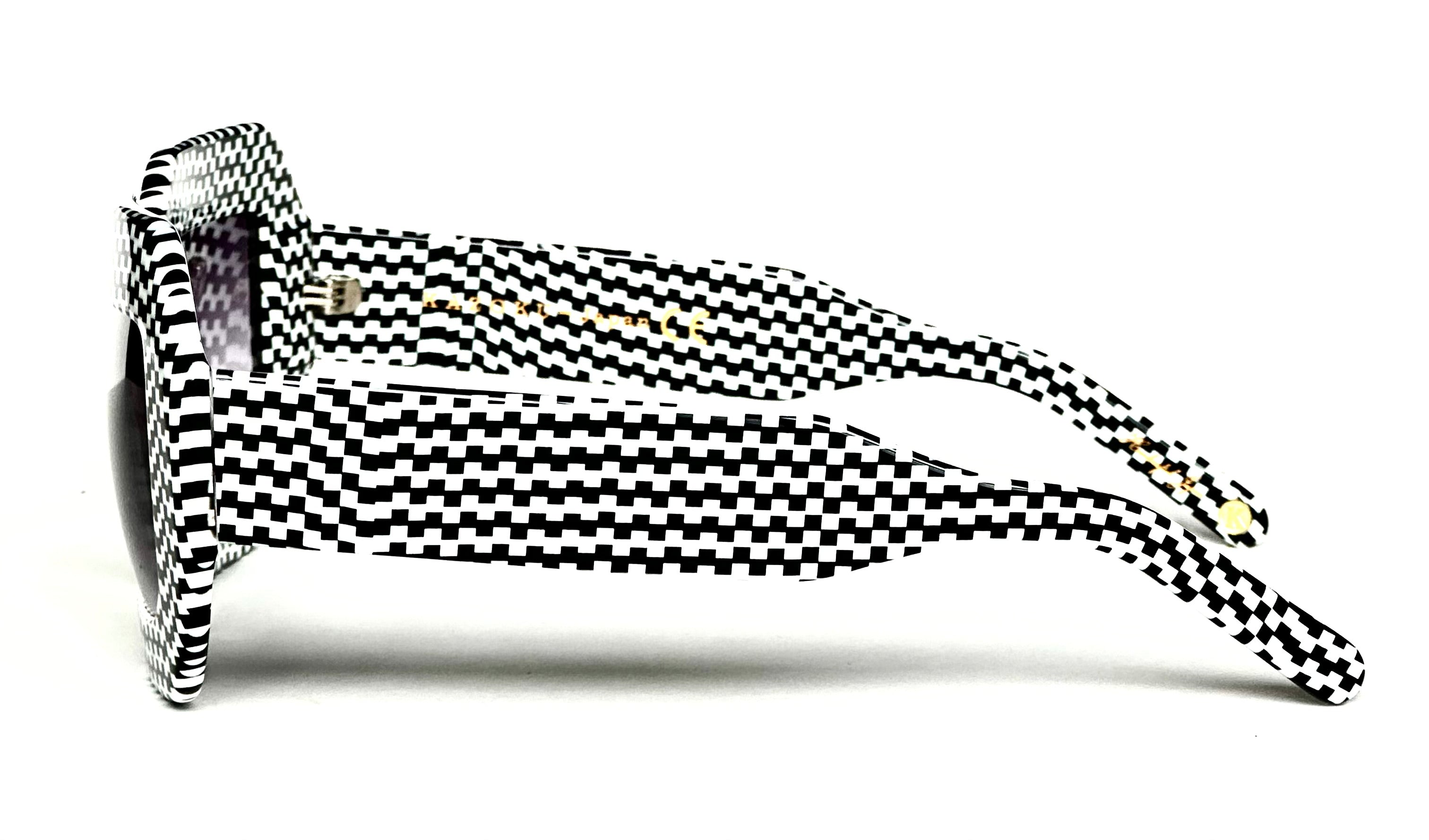 Stylish Renaissance sunglasses featuring a bold checkered design