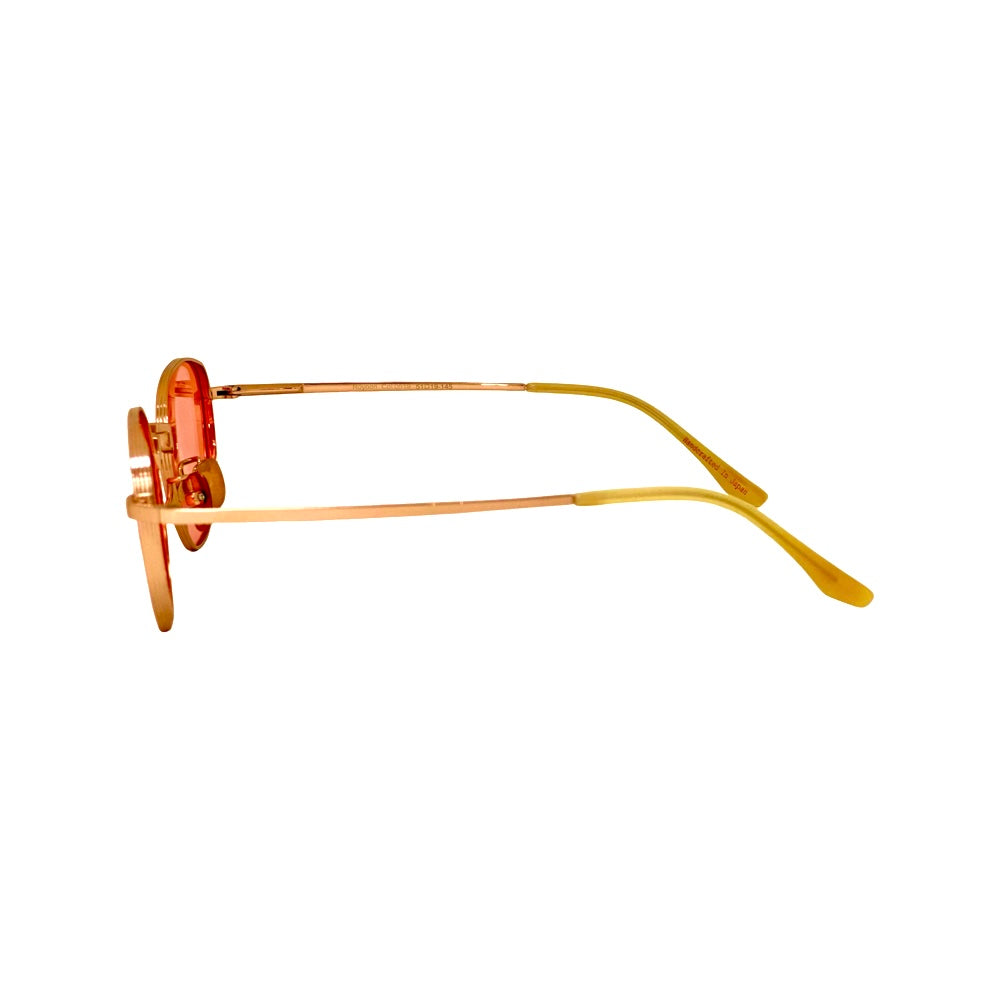 Gold-framed sunglasses with red-tinted lenses - ROYOON titanium sunglasses provide lightweight comfort with polycarbonate lenses