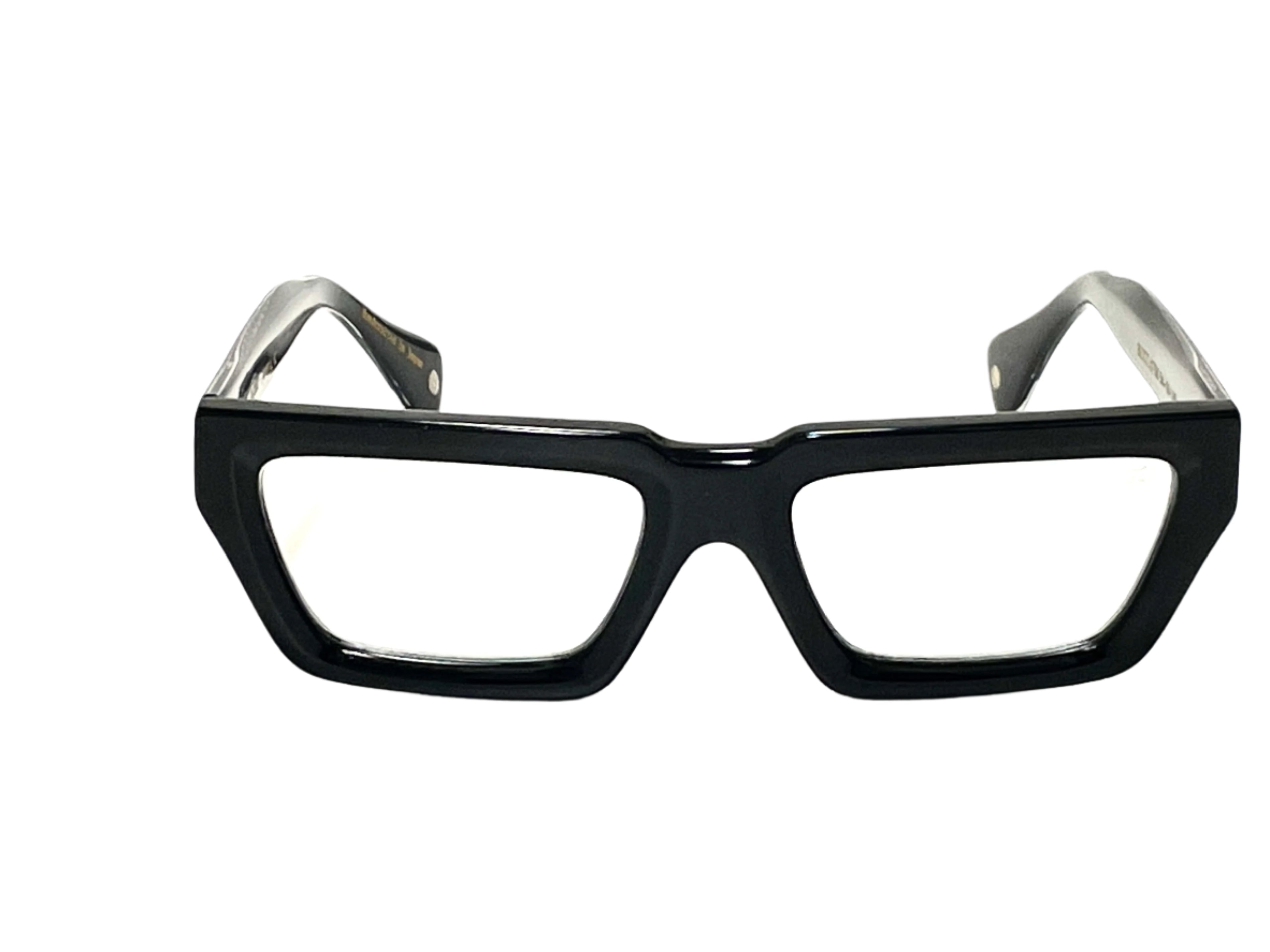 High-Quality Optical Frames - A pair of black framed glasses resting on a surface 
