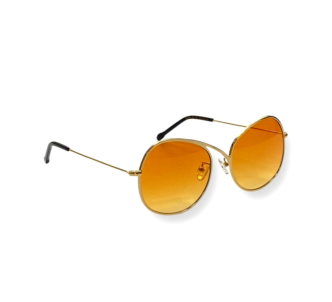 Escape a pair of sunglasses featuring yellow gold lenses - ESCAPE sunglasses for special occasions