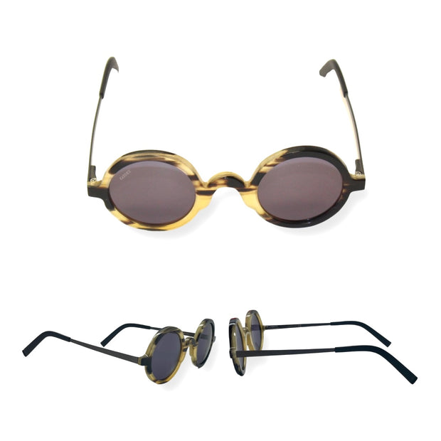 Blackbird । scratch-resistant sunglasses, unique horn frames, black with brown and yellow stripes, high-end eyewear, designer sunglasses, exclusive sunglasses, premium frames, artisanal sunglasses.