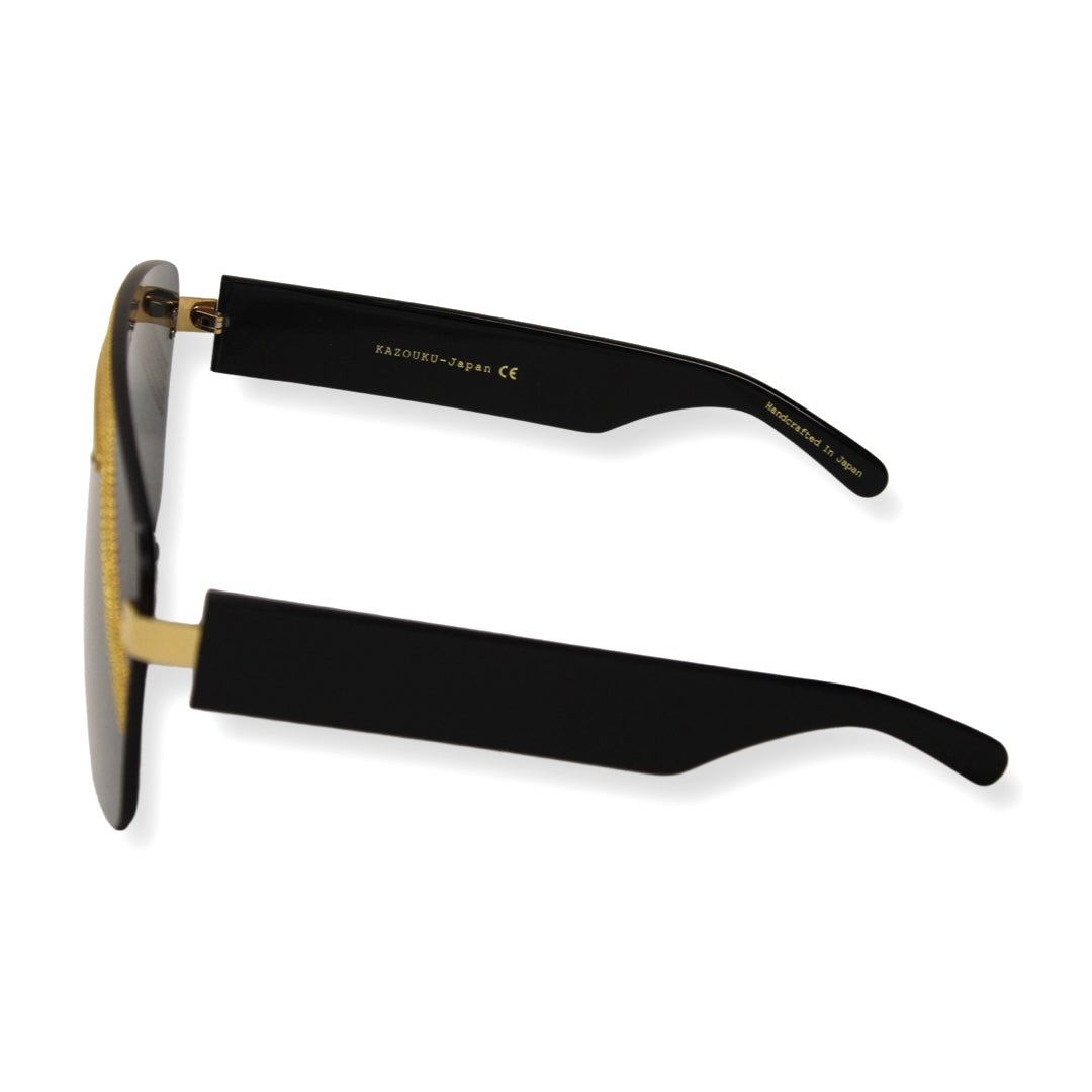 Luxury limited edition Relentless sunglasses with Trivex lens technology - Men's luxury sunglasses with 3mm Trivex and solid grey lenses – side angle - Kazoku Relentless sunglasses in case – limited edition luxury packaging.



