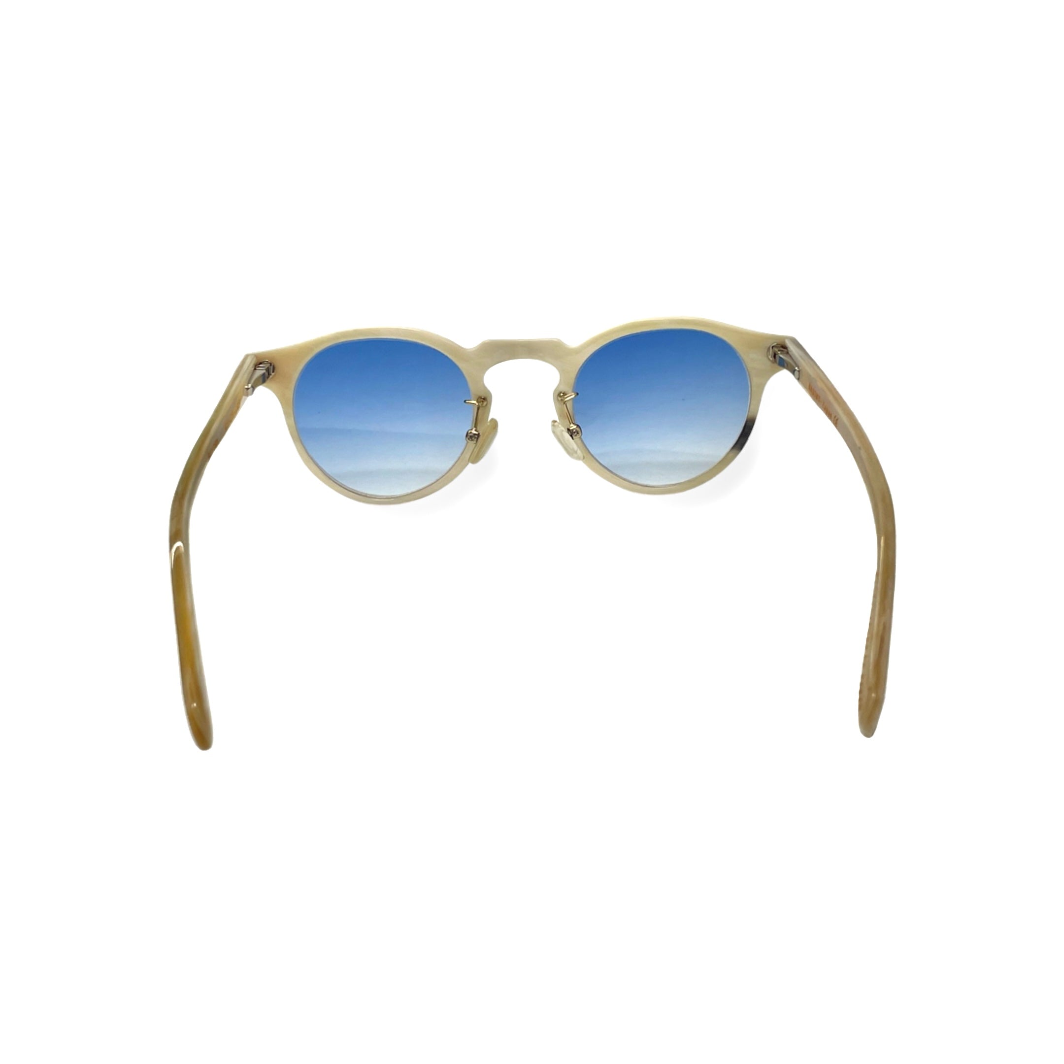 Natural white horn material combined with blue lens technology

Special edition eyewear featuring horn-to-horn construction

Handmade white horn frames with integrated nose pads