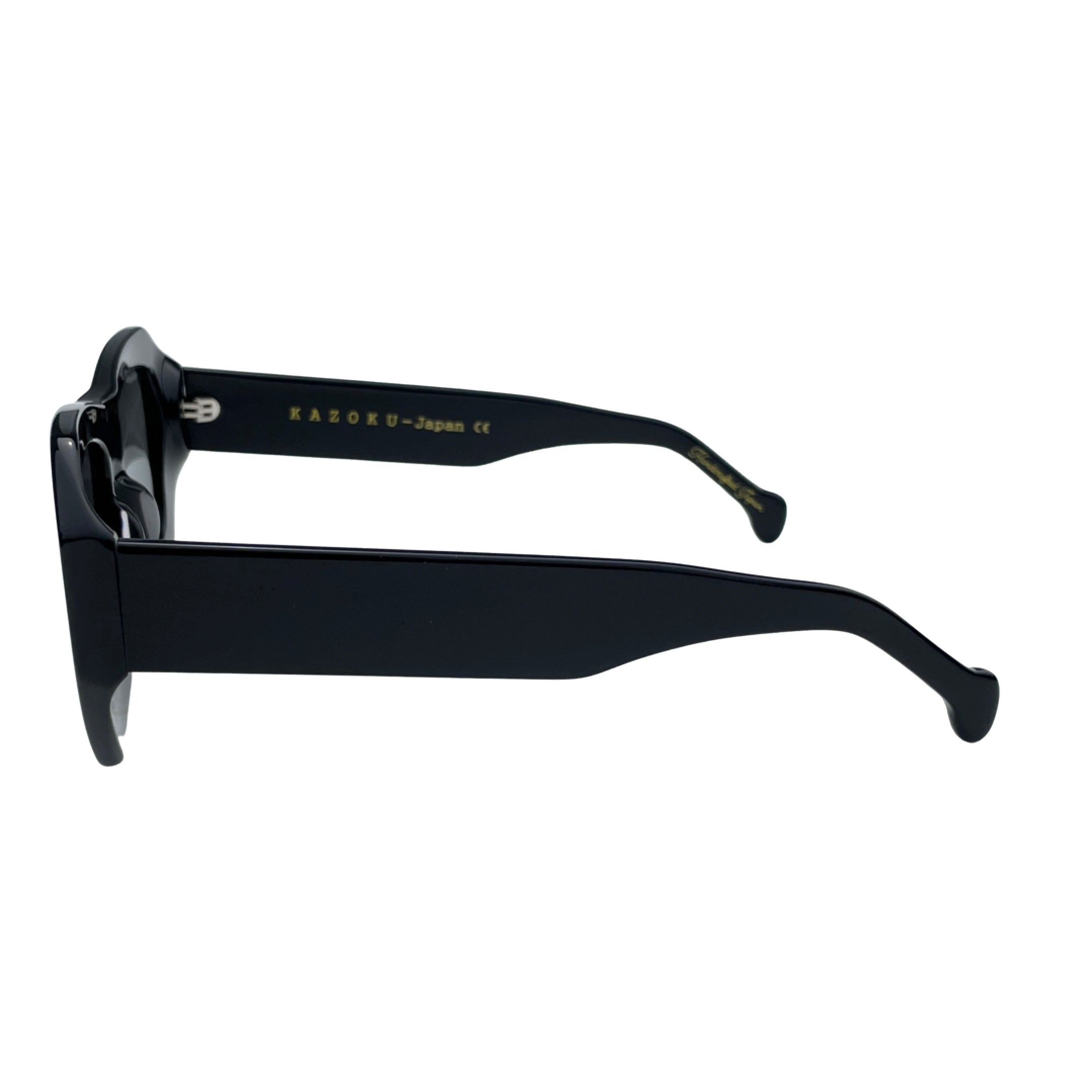 Rebel Black Durable acetate material that holds shape in sunglasses - The Rebel sunglasses displayed at outdoor café setting