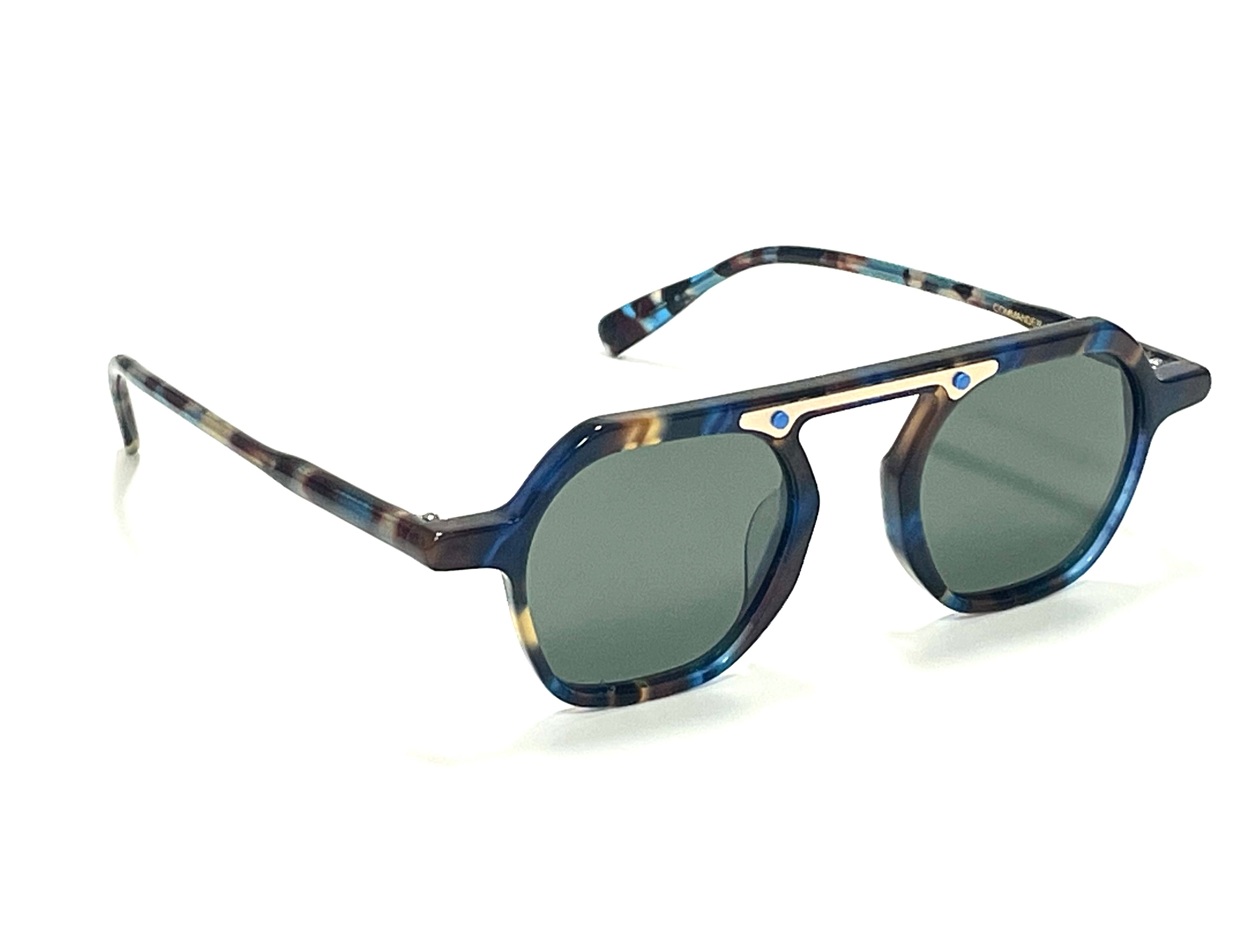 Modern Luxury Sunglasses - Kazoku Commander sunglasses with a blue and green frame, featuring polarized lenses and UV protection